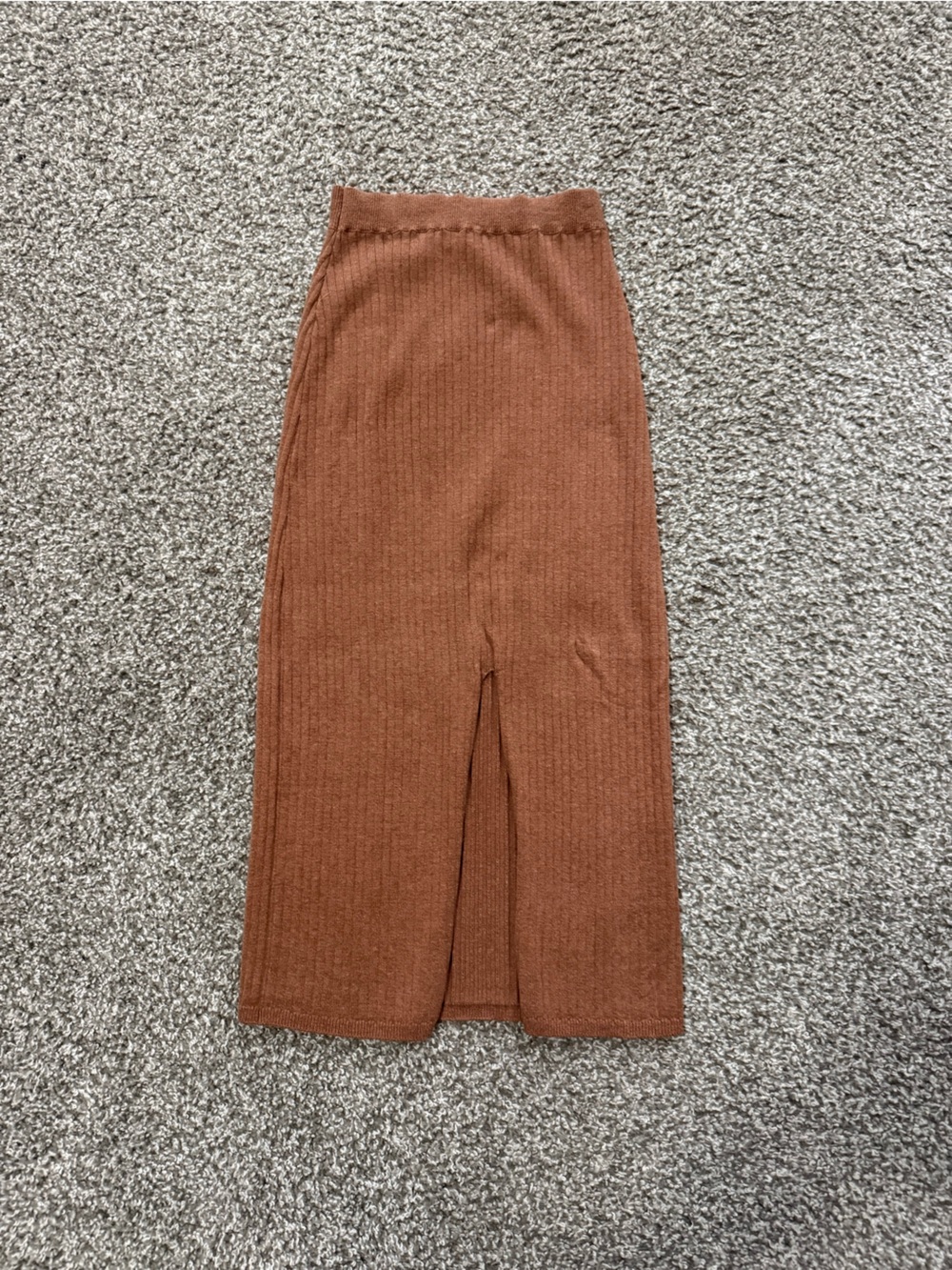 Free People Ribbed Knit skirt. Just past the knee. Slit in the front